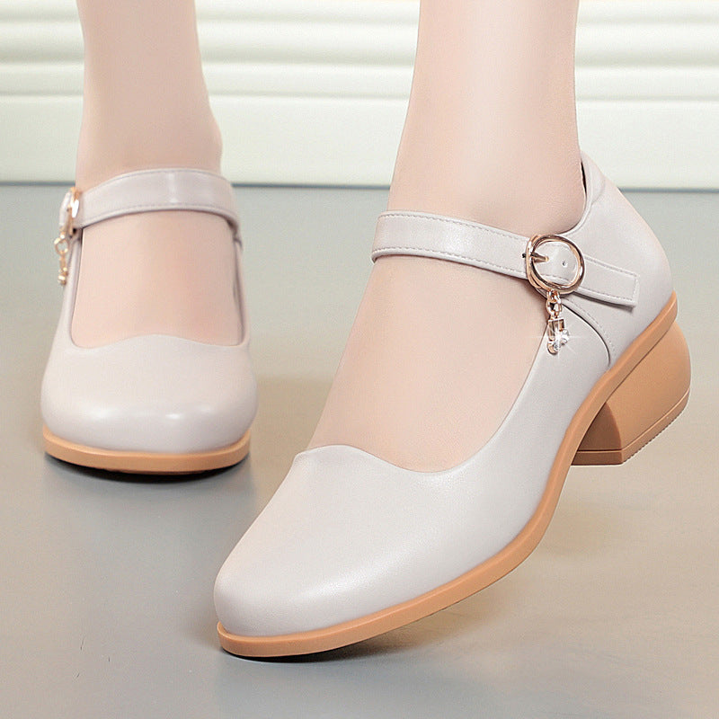 Zapatos de piel con tacón grueso y punta redonda