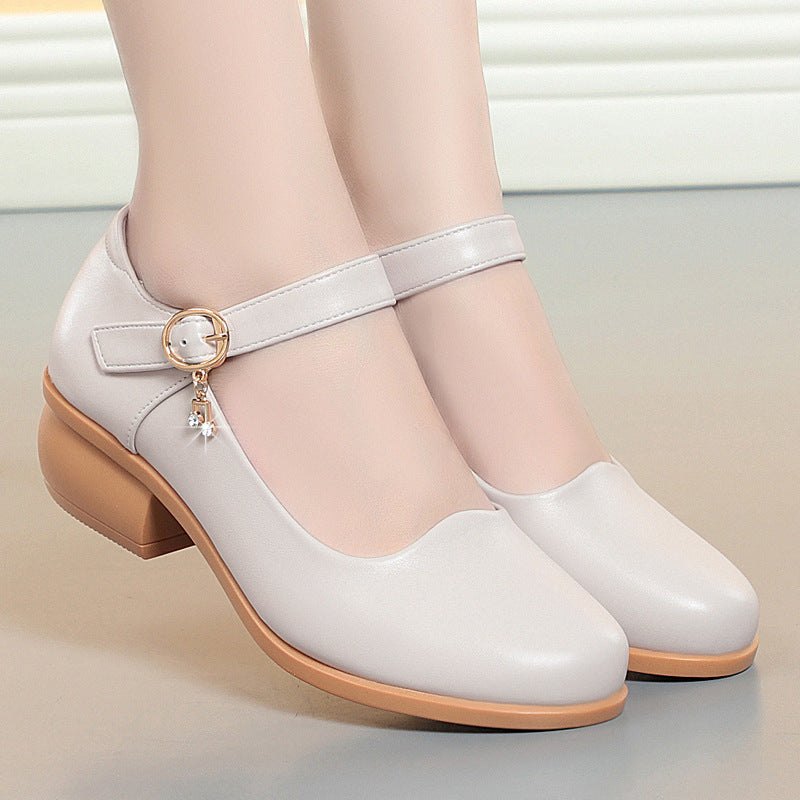 Zapatos de piel con tacón grueso y punta redonda