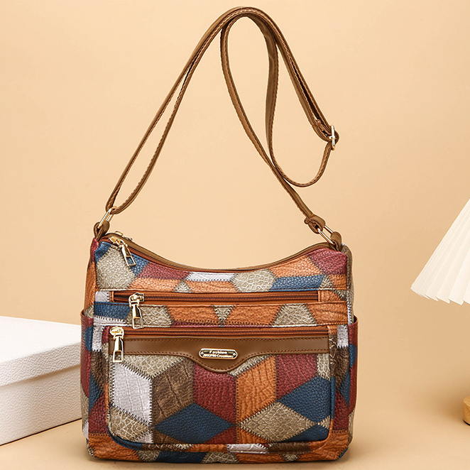 Bolso de piel con bloques de color