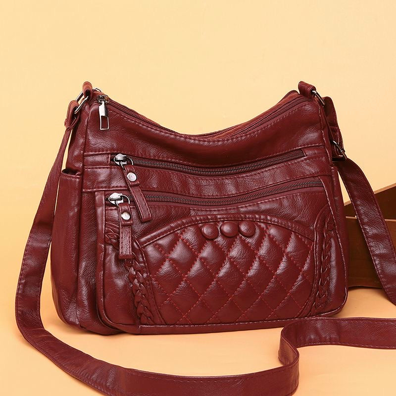 Bolso bandolera multicapa de piel suave