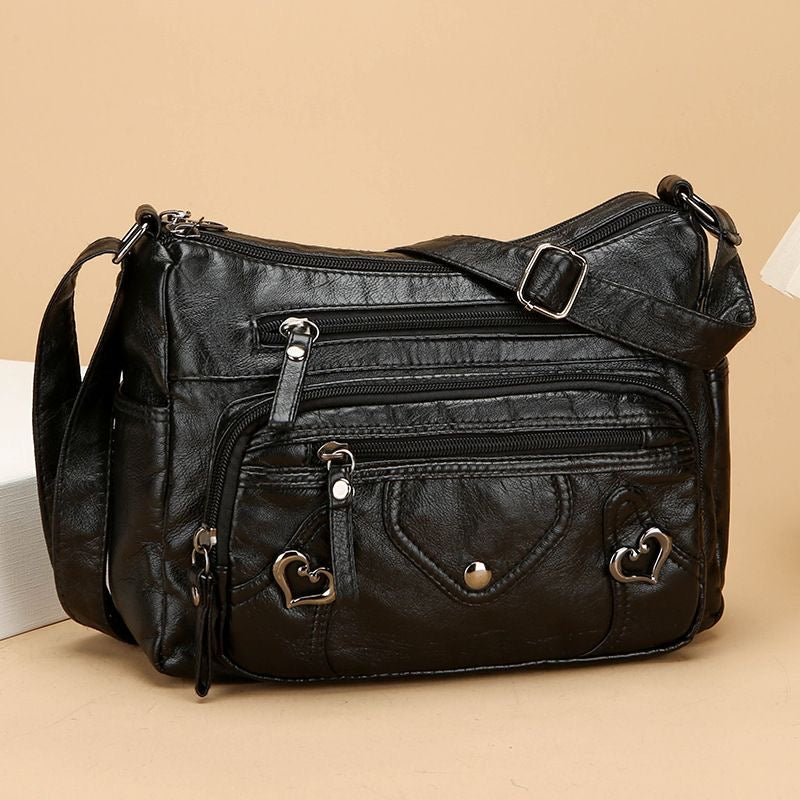 Bolso de cuero decorativo en forma de corazón