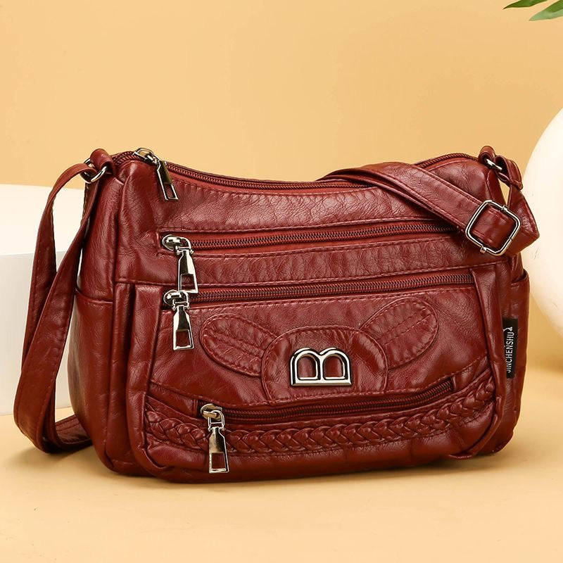 Práctico bolso bandolera de piel suave