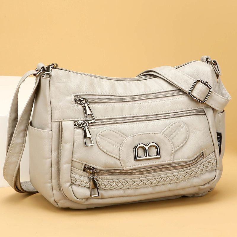 Práctico bolso bandolera de piel suave
