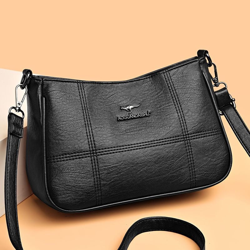 Bolso bandolera de piel suave con patchwork