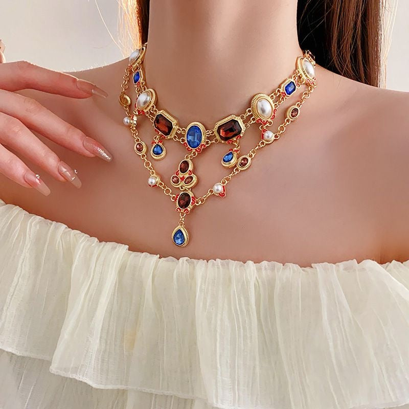 Collar y pendientes vintage con borlas de diamantes
