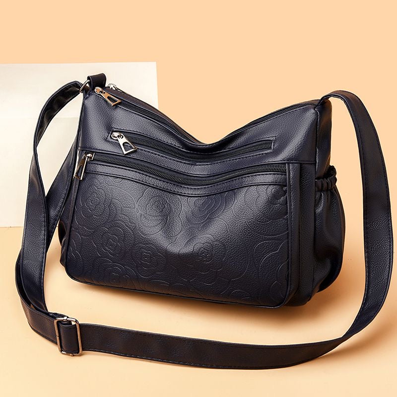 Bolso de piel con estampado de rosas
