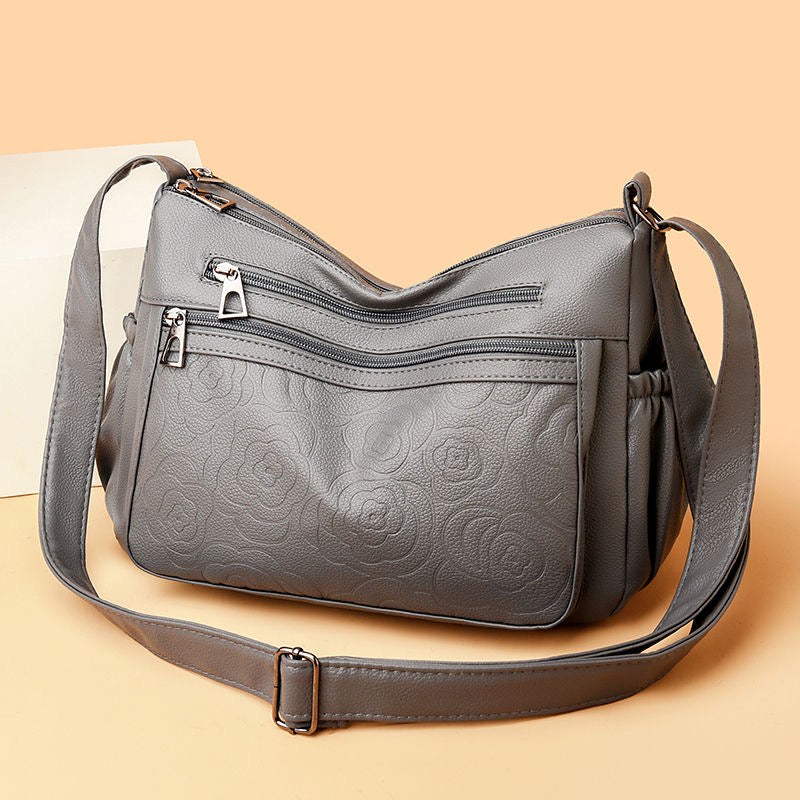 Bolso de piel con estampado de rosas
