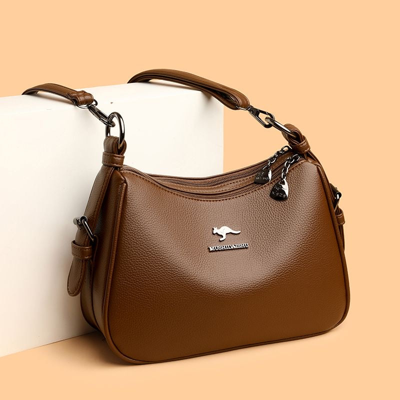 Bolso bandolera clásico de piel suave