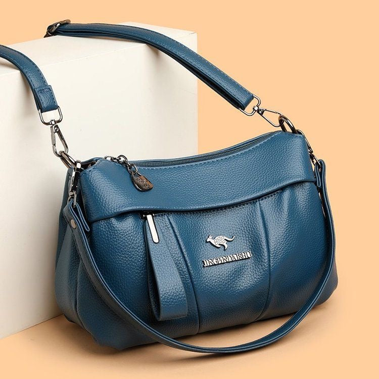 Bolso bandolera de piel suave con logotipo