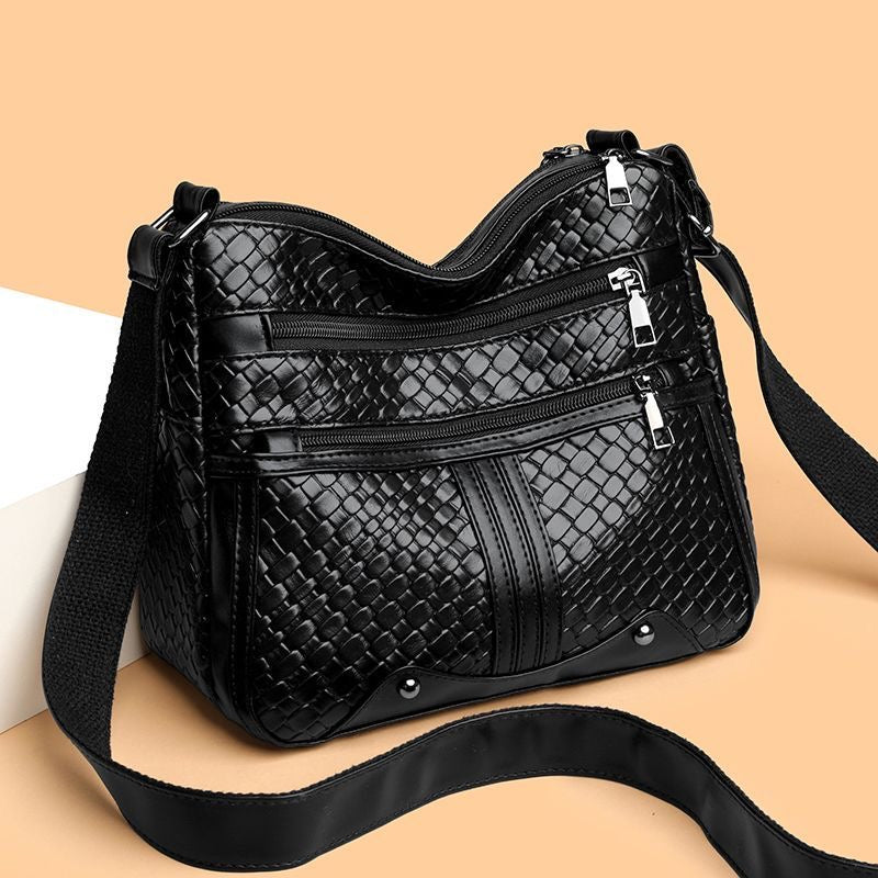 Bolso de piel trenzada suave