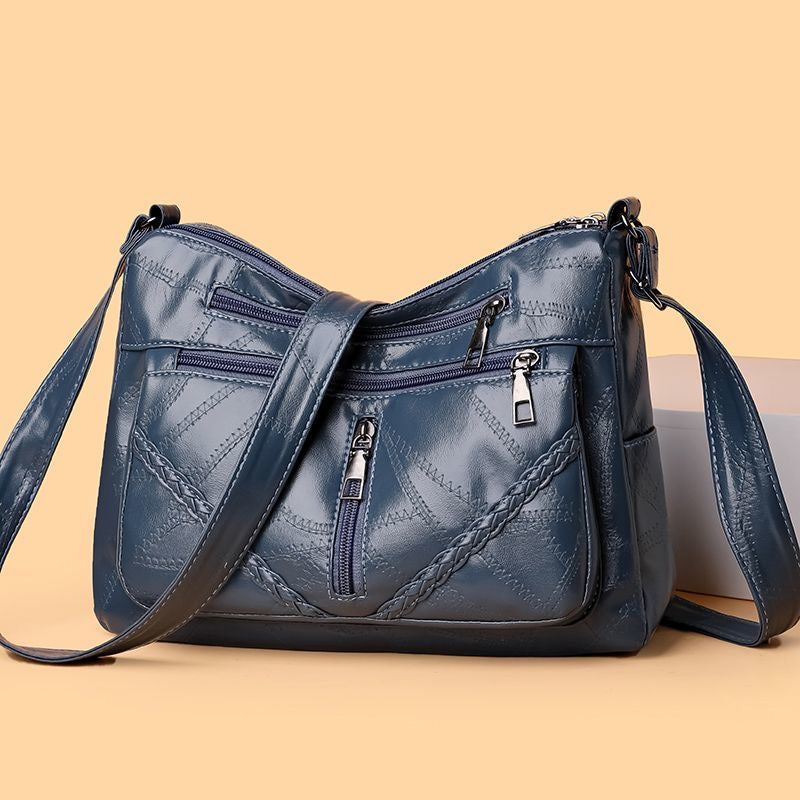 Bolso bandolera de piel suave tejida