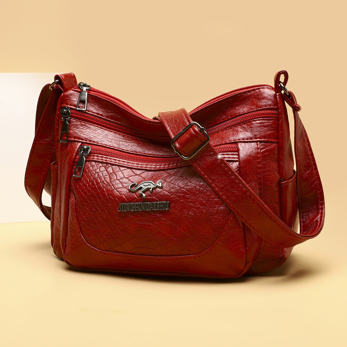 Bolso bandolera de piel suave estampada