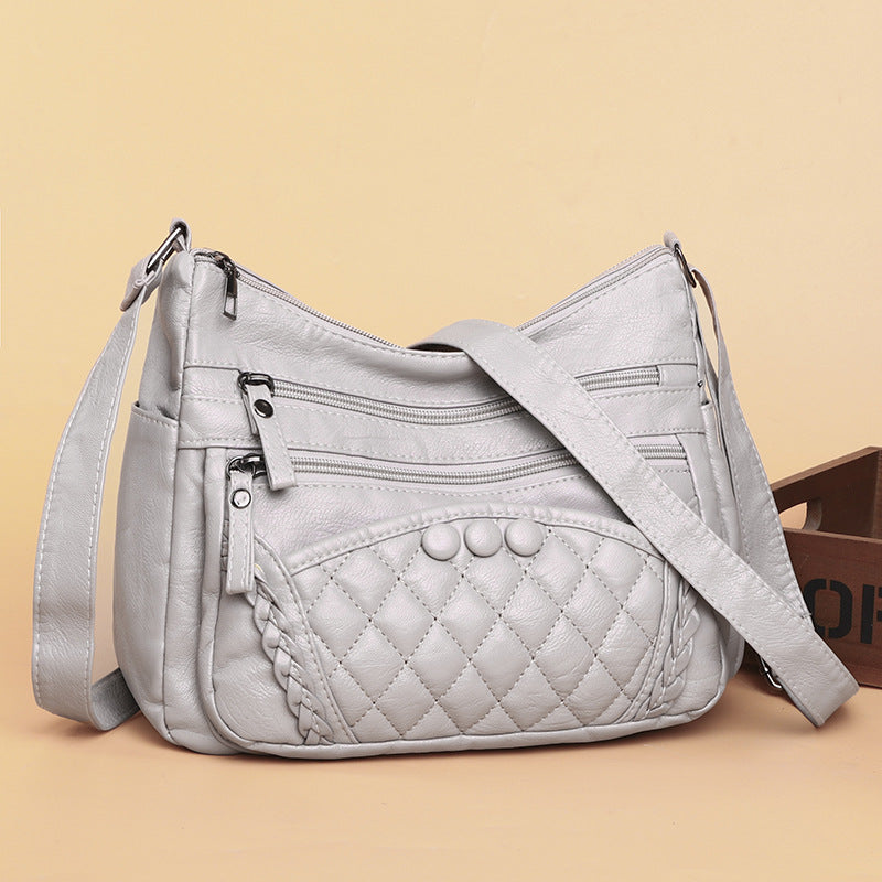 Bolso bandolera multicapa de piel suave