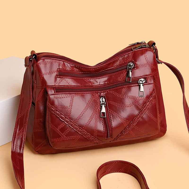 Bolso bandolera de piel suave tejida