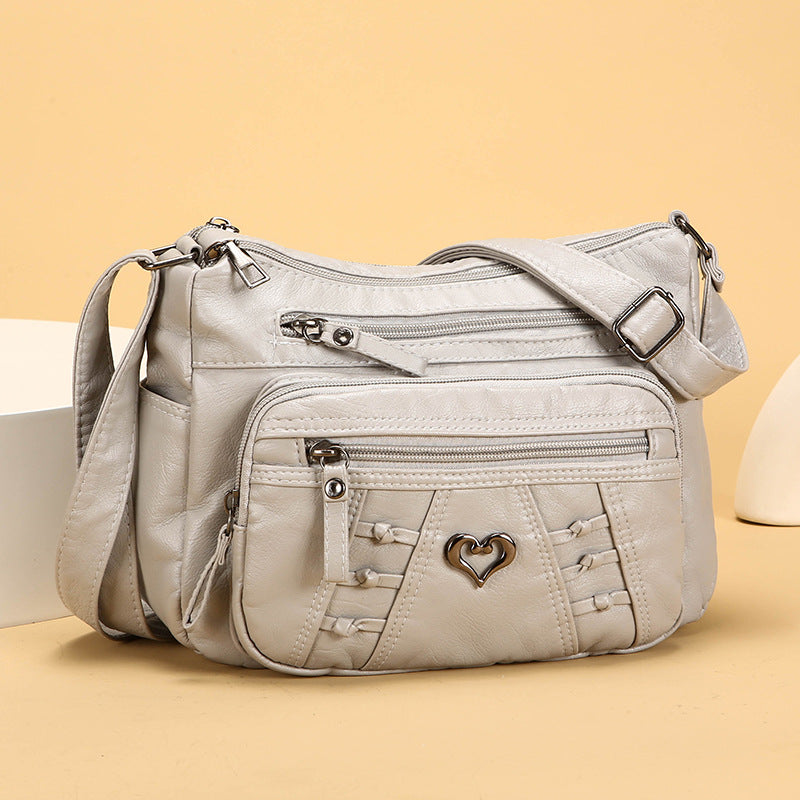 Bolso de piel práctico e informal con múltiples bolsillos
