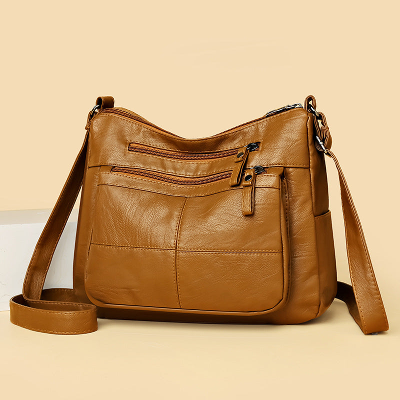 Bolso bandolera de piel suave a cuadros