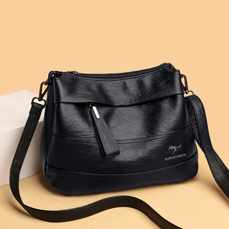 Bolso bandolera de piel suave con cremallera