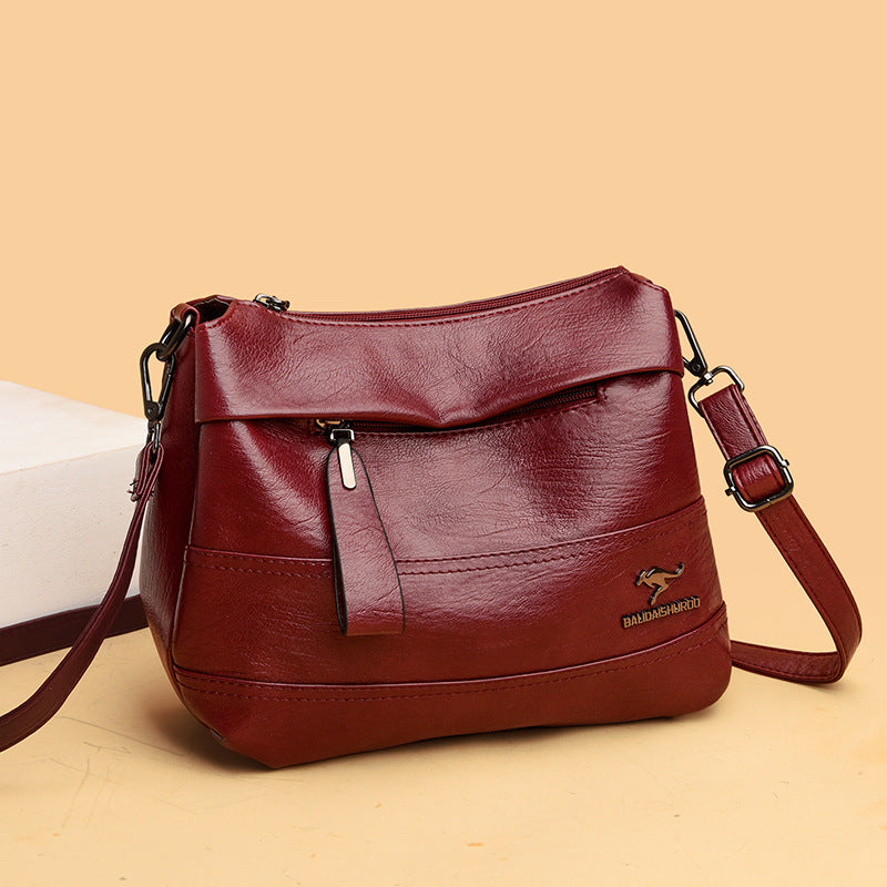 Bolso bandolera de piel suave con cremallera