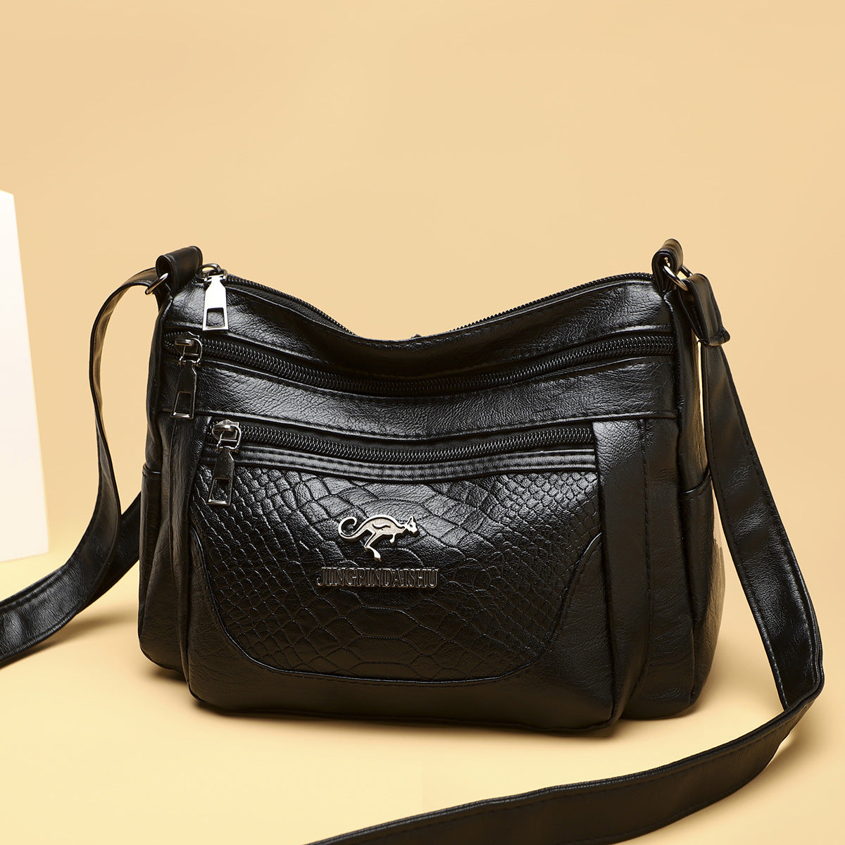 Bolso bandolera de piel suave estampada