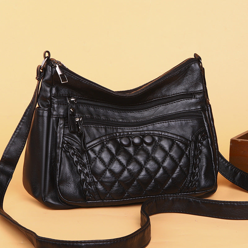 Bolso bandolera multicapa de piel suave