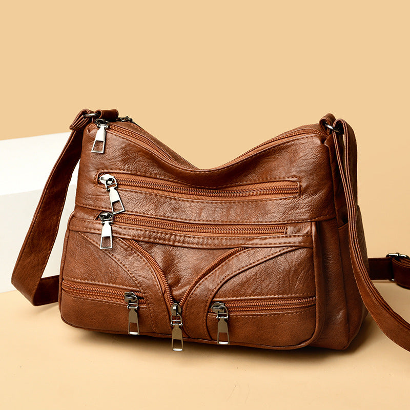 Bolso bandolera versátil de piel