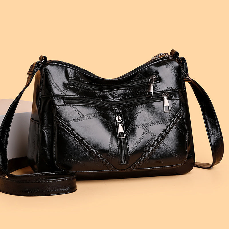 Bolso bandolera de piel suave tejida