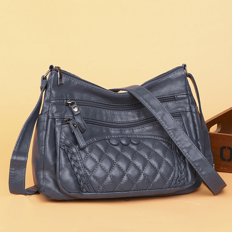 Bolso bandolera multicapa de piel suave