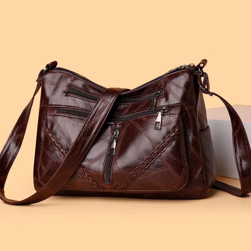 Bolso bandolera de piel suave tejida