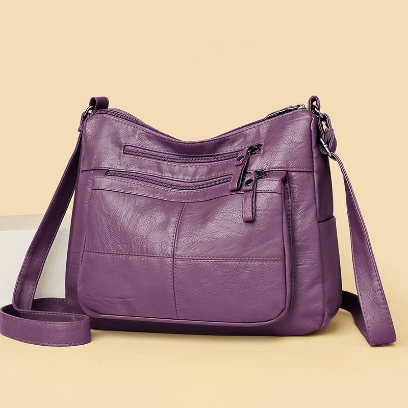 Bolso bandolera de piel suave a cuadros
