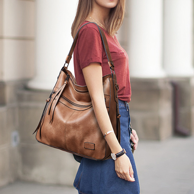 Bolso de mano nuevo de piel suave