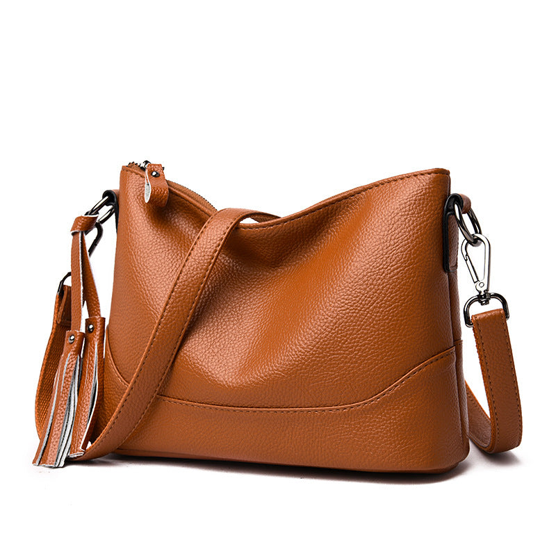 Bolsa de hombro y cruzada de piel suave