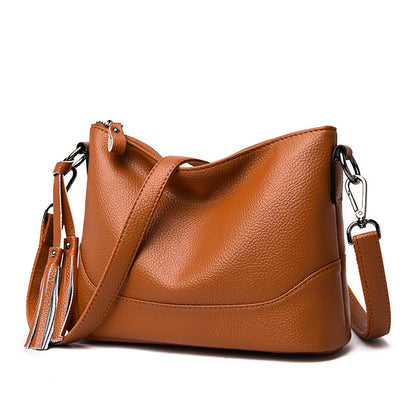Bolsa de hombro y cruzada de piel suave