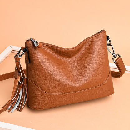 Bolsa de hombro y cruzada de piel suave