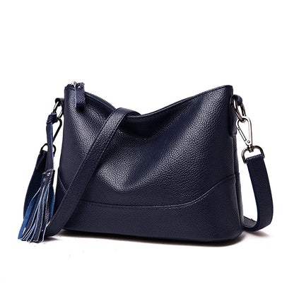 Bolsa de hombro y cruzada de piel suave