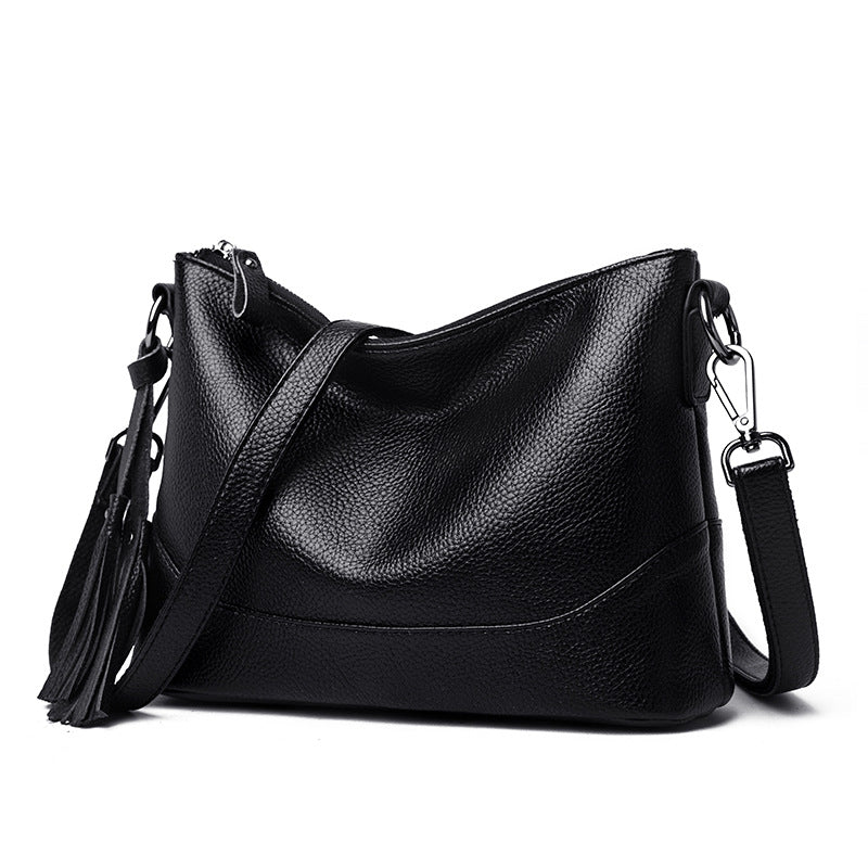 Bolsa de hombro y cruzada de piel suave