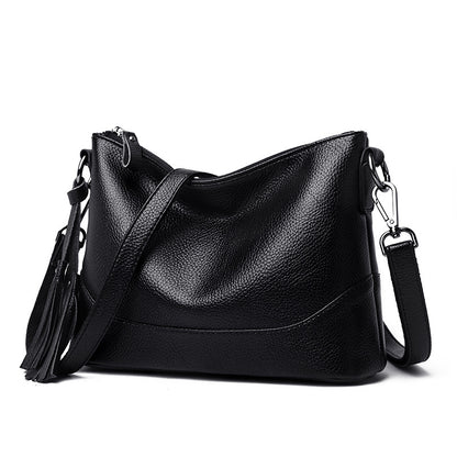 Bolsa de hombro y cruzada de piel suave