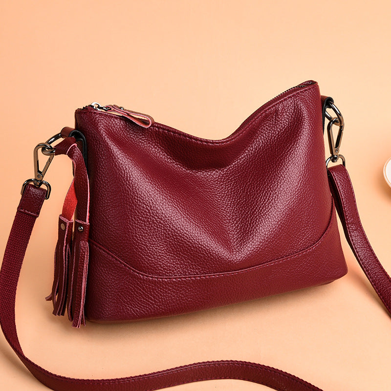Bolsa de hombro y cruzada de piel suave