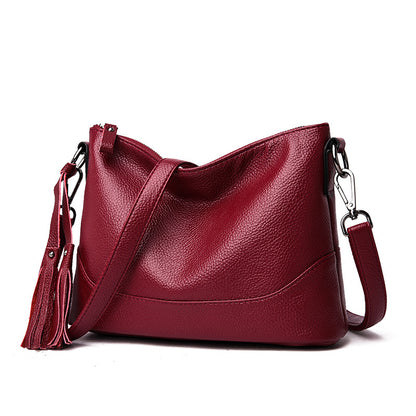 Bolsa de hombro y cruzada de piel suave