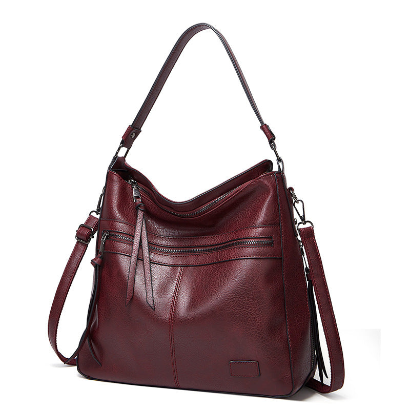 Bolso de mano nuevo de piel suave