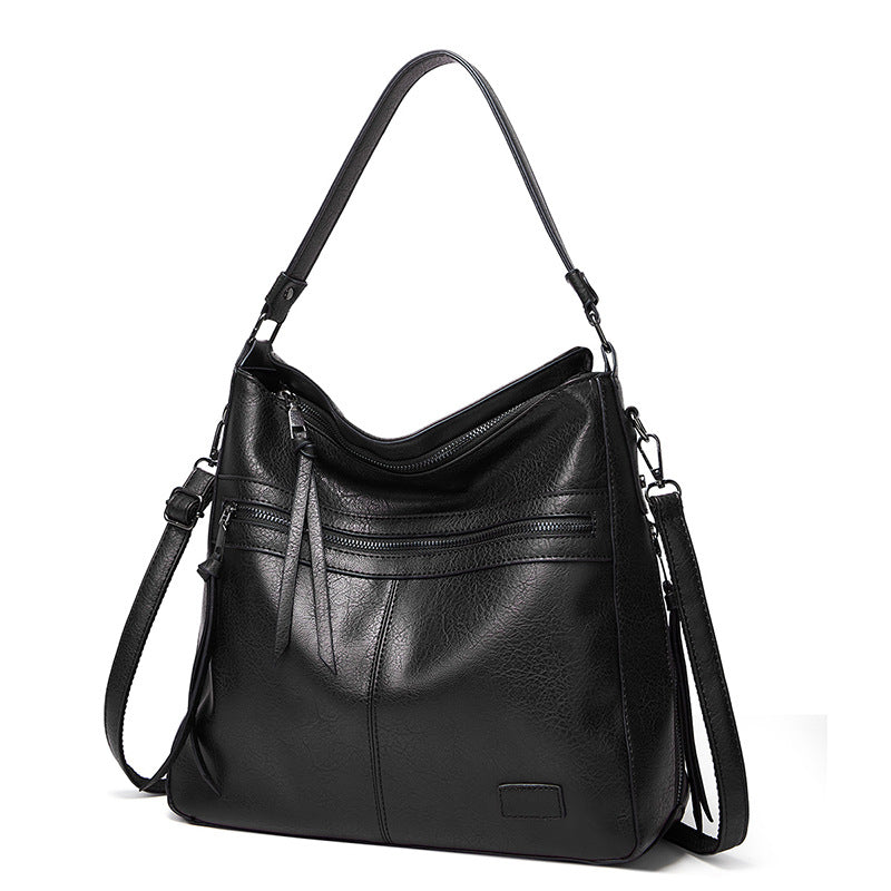 Bolso de mano nuevo de piel suave