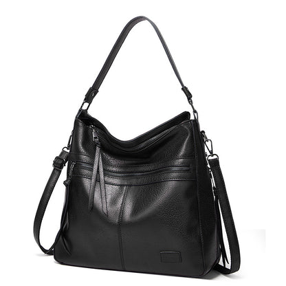 Bolso de mano nuevo de piel suave