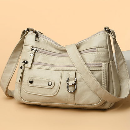 Bolso de piel con doble anilla
