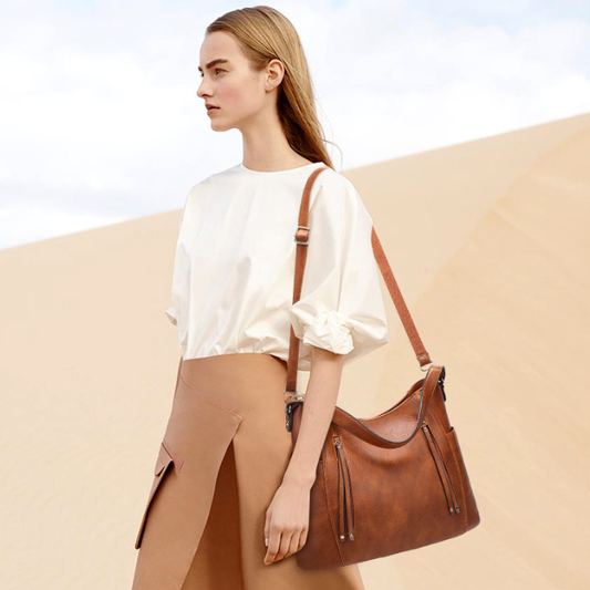 Bolso de mujer con borla y doble cremallera