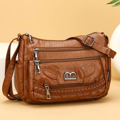 Práctico bolso bandolera de piel suave