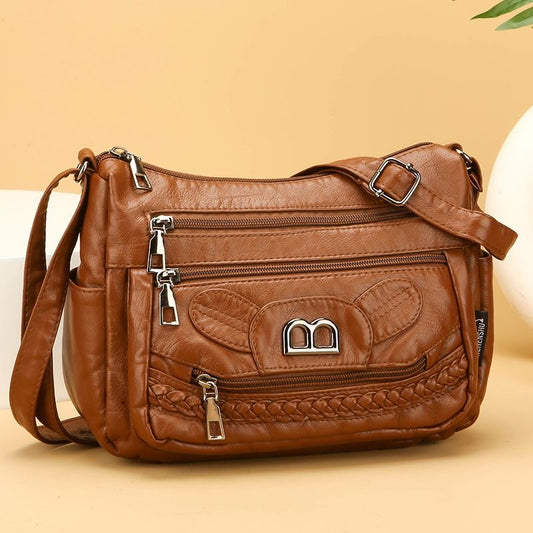 Práctico bolso bandolera de piel suave