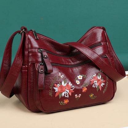 Bolso de piel con estampado bordado