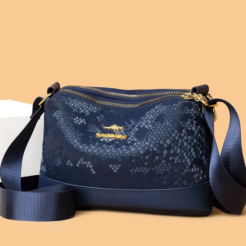 Bolso de piel brillante texturizada en dos tonos