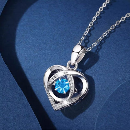 Colgante de corazón palpitante de lujo y luz