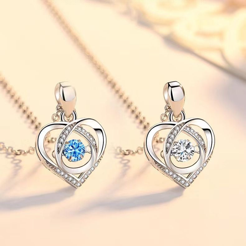 Colgante de corazón palpitante de lujo y luz