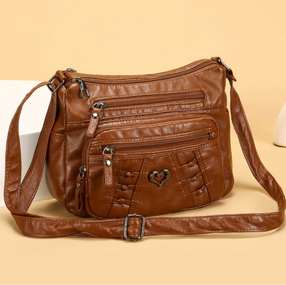 Bolso de piel práctico e informal con múltiples bolsillos